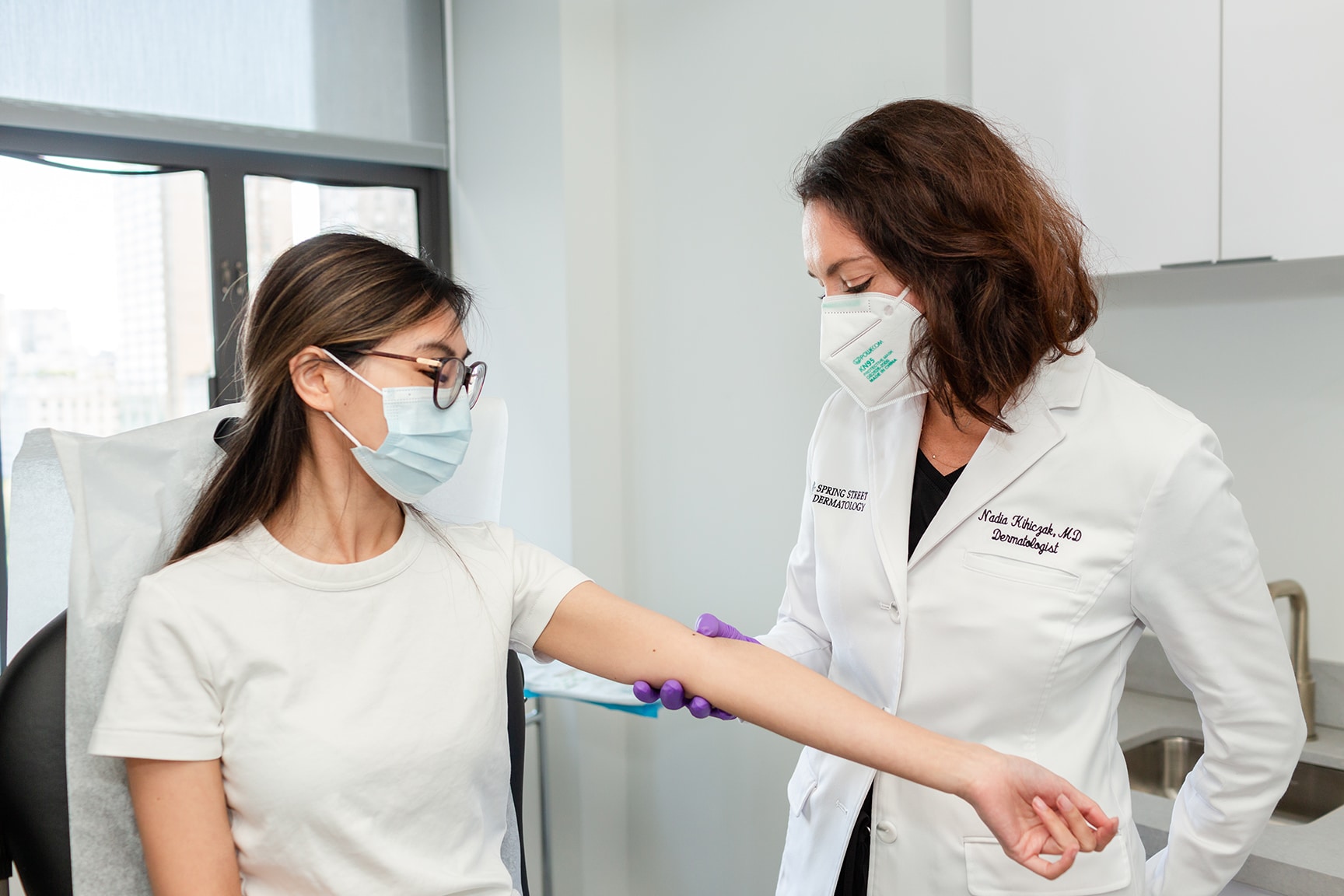 dermatologist consulting with a patient about laser hair removal treatments in NYC