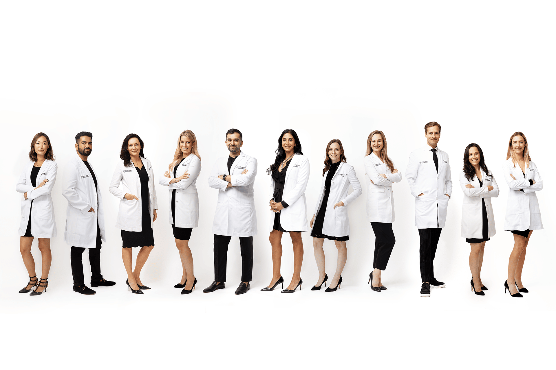 Group photo of Board Certified Dermatologists at Spring Street Dermatology, New York City, NY.